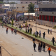 Anti-government demonstrators block a road in Bamenda, Cameroon, December 8